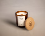 Cedar Veil candle with cork lid beside jar.